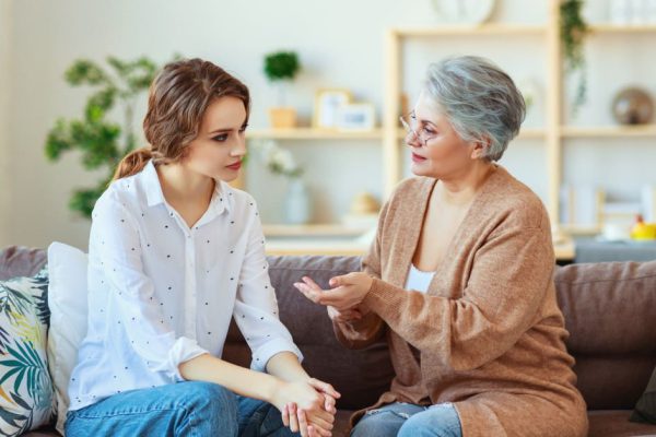 conflict of  family two generations old mother and adult daughter