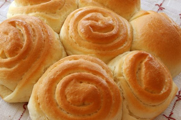 appetizing decorative round white bread on table closeup