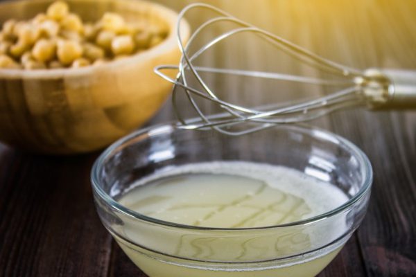 Chickpea liquid water brine draining. Vegan Aquafaba