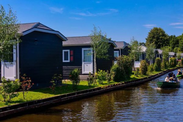 Giethoorn, Netherlands - July 4, 2018: view of famous village Giethoorn with canals in the Netherlands. Giethoorn is also called 'Venice of The Netherlands'