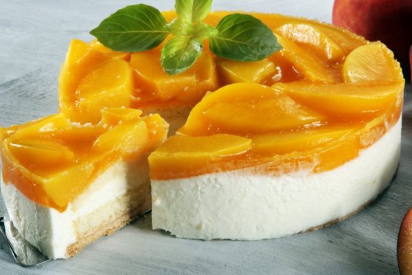 cheesecake with peache. Homemade cream cake with peaches.