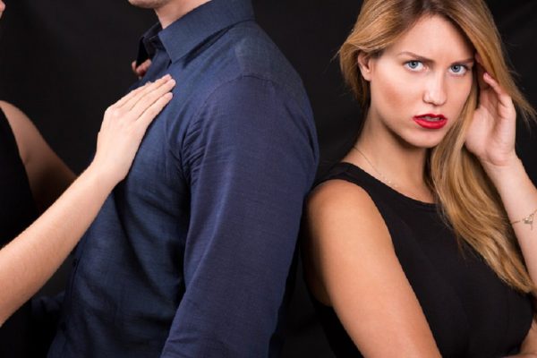 Man betraying his girlfriend with other woman