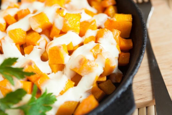 delicious pieces of pumpkin with cream sauce