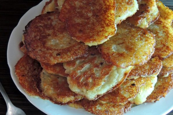 Potato Pancake on a wooden table . .