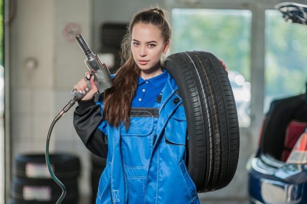 Beautiful girl at work in the showroom