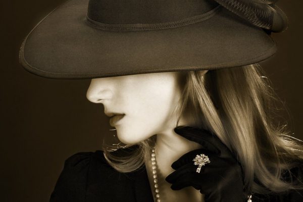 Beautiful young woman dressed in vintage style