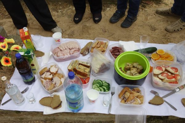 Borisov, Belarus - 10 May 2016: Radunica - spring holiday of remembrance of the dead in the eastern Slavs. People come to the cemetery to remember deceased relatives.