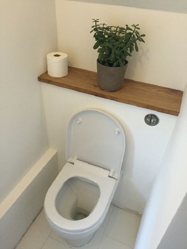 дизайн маленького туалета с обоями