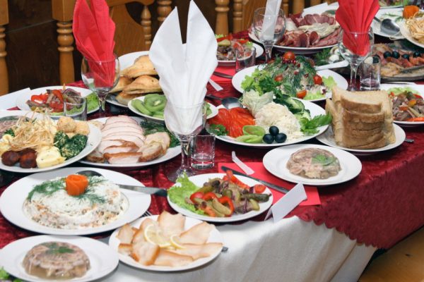 Festively covered Russian table with various dishes