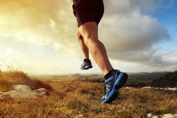 Outdoor cross-country running in early sunrise concept for exercising, fitness and healthy lifestyle