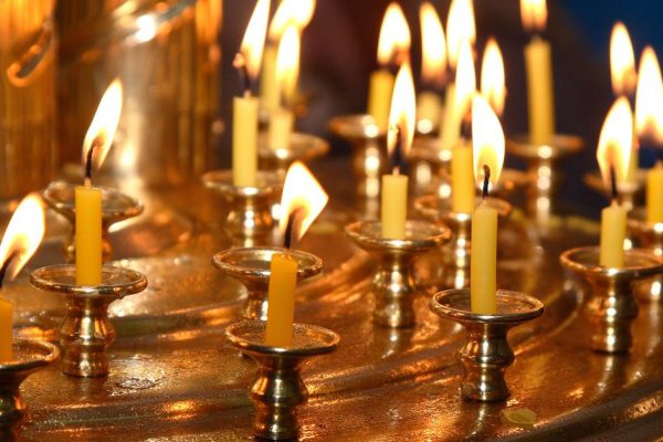 Church wax candles on a candlestick