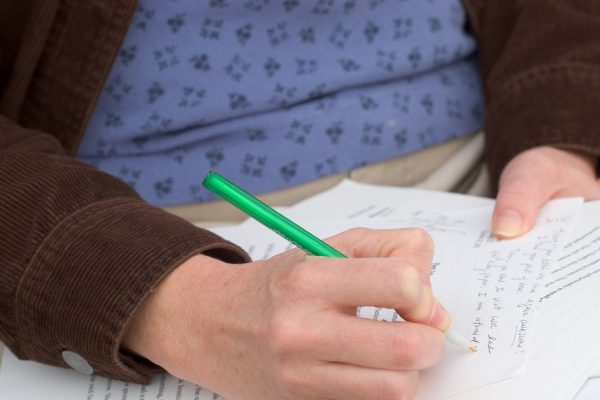 Photo of a woman grading papers