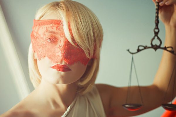 Themis photo of blond woman with scales