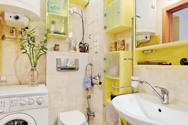 Part of small Modern Bathroom with washing mashine