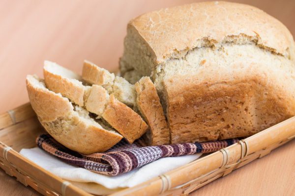 Freshly baked white bread on a wooden board