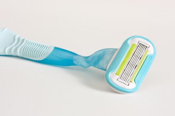 Close up photo of razor isolate on white background.