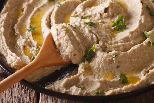 Arabic appetizer: baba ghanoush macro in a plate. horizontal