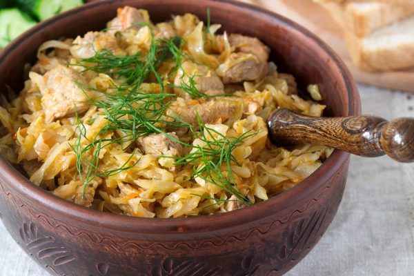 A traditional dish of some European countries is bigos made from cabbage, other vegetables and meat. Selective focus.