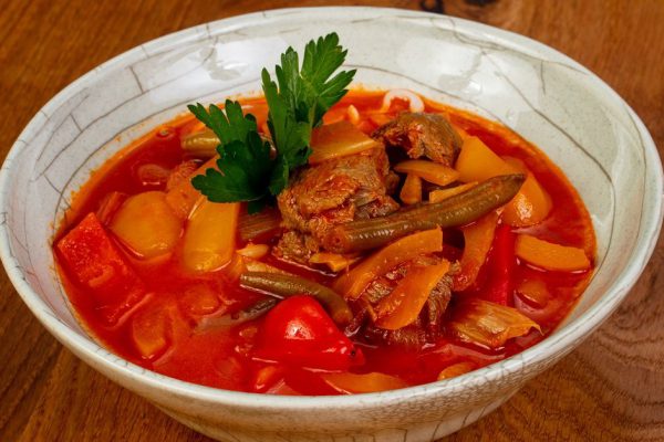 Traditional lagman soup with lamb