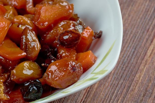 tzimmes - traditional Ashkenazi Jewish sweet stew .made from carrots and dried fruits such as prunes or raisins