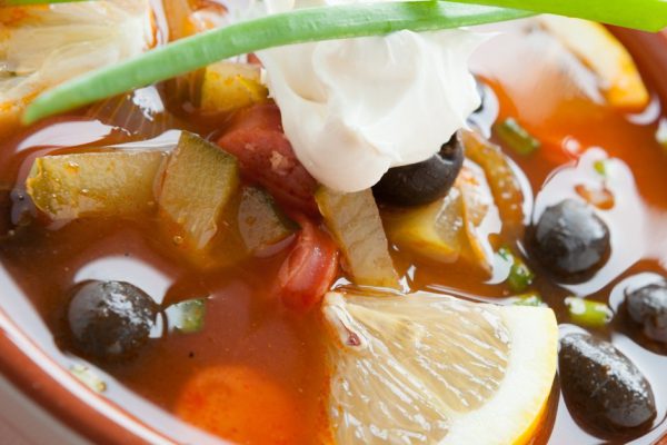 thick and rich with sour cream solyanka, closeup