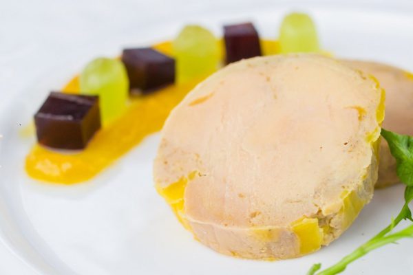 Foie gras with port wine jelly , mango confit and brioche