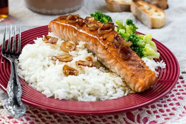 Maple glazed salmon with caramelized onions served with rice