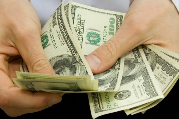 american dollars in the hands