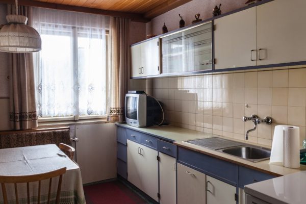 interior of an old simple kitchen that should be renovated