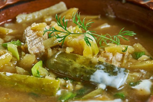 Rassolnik, Russian traditional soups , assorted dishes, Top view.made from pickled cucumbers, pearl barley, and pork or beef kidneys
