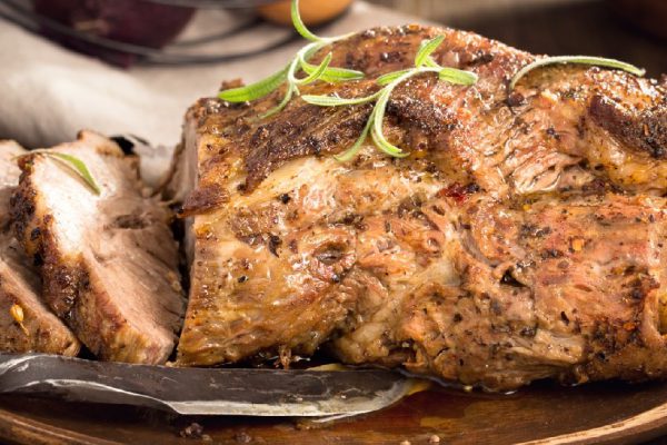 Sliced roasted pork with spices rustic style