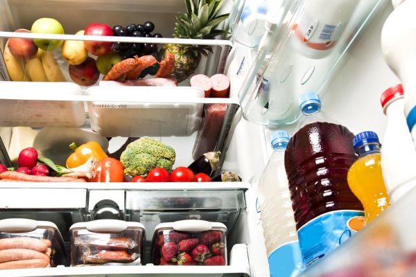 Refrigerator full of food close up