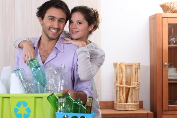 Couple sorting the recycling