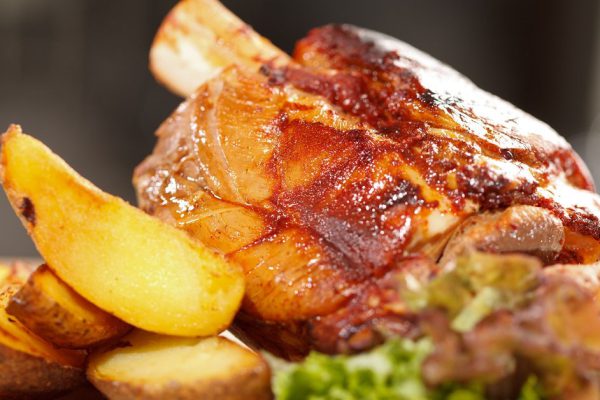 roasted pork knuckle with potatoes