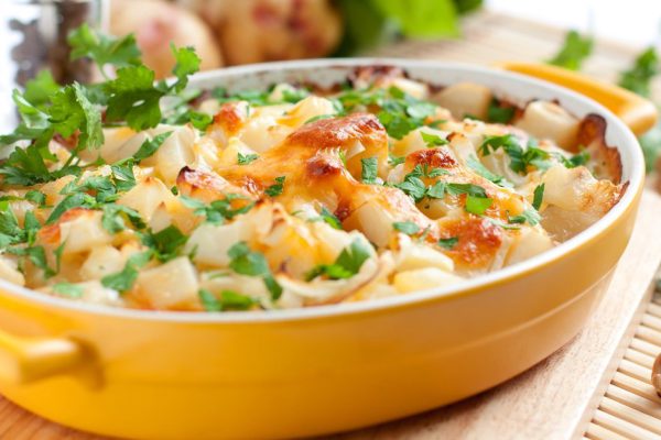 Appetizing gratin  in the yellow form for baking