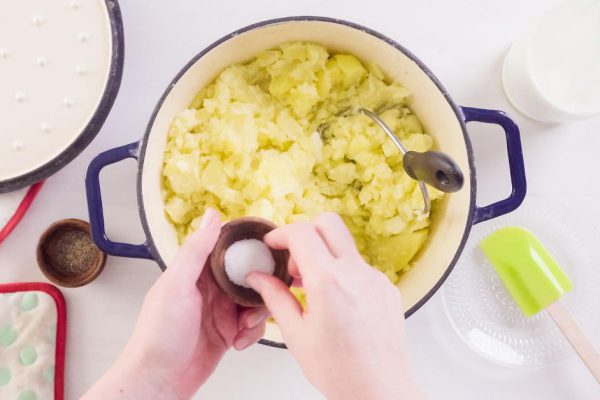 Step by step. Preparing classic mashed potatoes for Thanksgiving dinner.