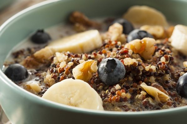 Organic Breakfast Quinoa with Nuts Milk and Berries