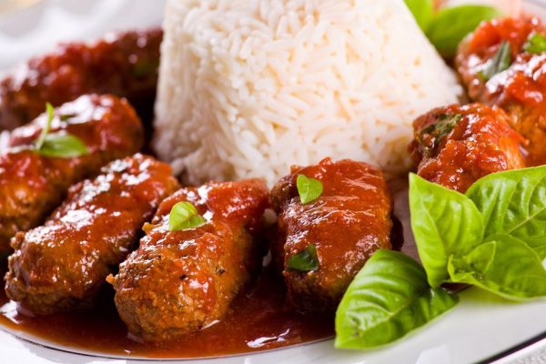 Photograph of a traditional greek meal with meatballs