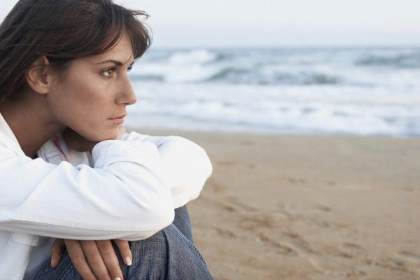 Pensive Woman on the Beach