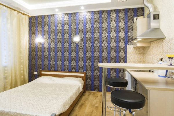 За что хозяйки обожают кухни, объединенные с гостиной