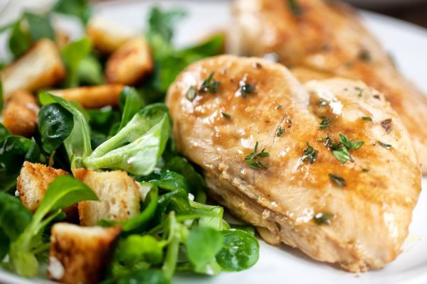 Grilled chicken breast with salad