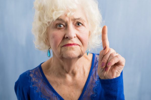 Grandma holding her finger up
