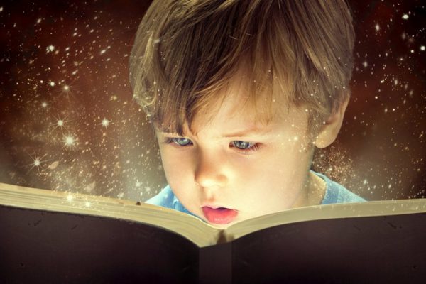 Little boy and the old magic book