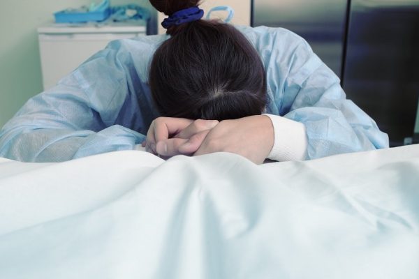 Family mourns for the dead in hospital