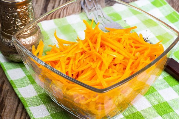 Salad with pumpkin, carrots in Korean. Studio Photo