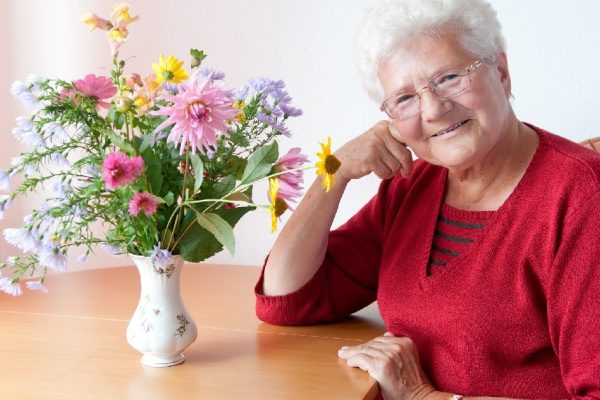 Portrait of an old woman in the living room