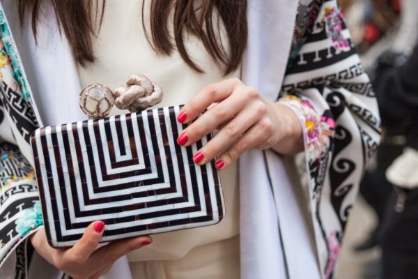 Milan, Italy - February 25, 2015: people attending the Gucci Fashion show during Milan Fashion Week  Women Fall/Winter 2015/16