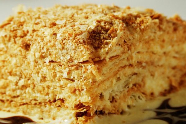 Sweet napoleon cake with vanilla and chocolate cream