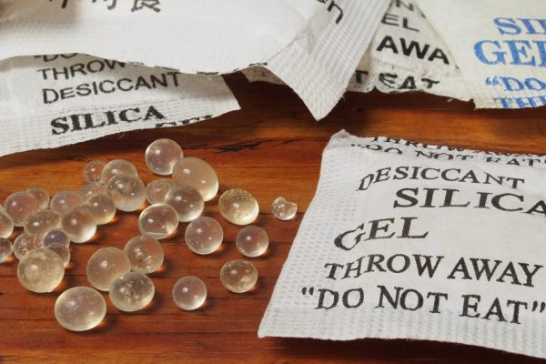 Macro of silica gel bags on a table