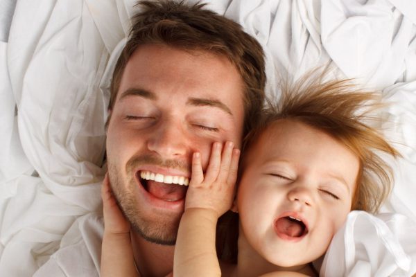 Father and daughter laughing and bonding